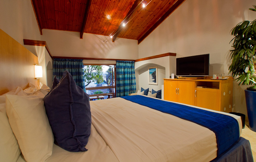 Фото отеля Coco de Mer Hotel & Black Parrot Suites. Номер Standard Room. Спальня
